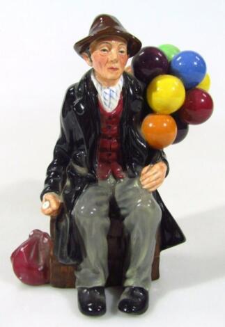 A Royal Doulton figure The Balloon Man