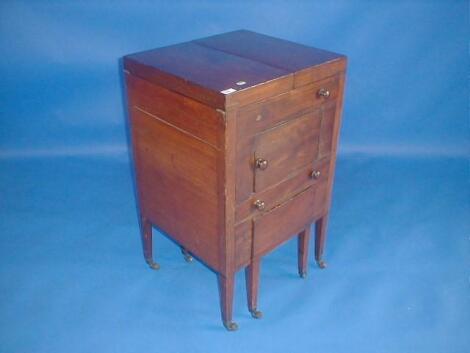 A George III mahogany gentleman's dressing cabinet with later conversions