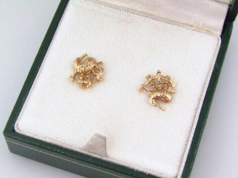 A pair of 9ct gold bagpipe shaped earrings