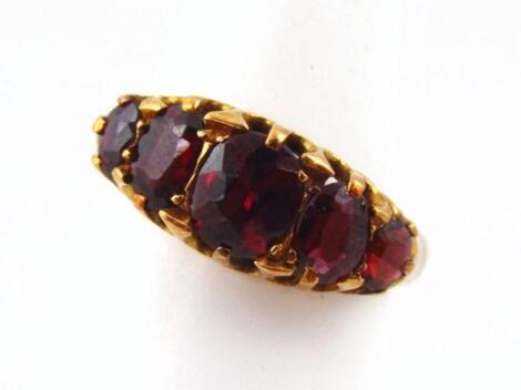 A garnet set dress ring