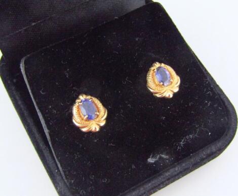 A pair of 9ct gold stone set earrings