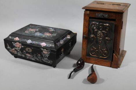 An Edwardian oak Art Nouveau smoker's cabinet