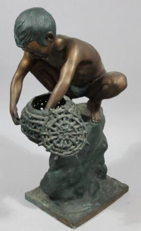 C Brosco (early 20thC). Figure peering over open basket