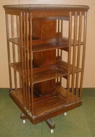 A Victorian walnut revolving bookcase