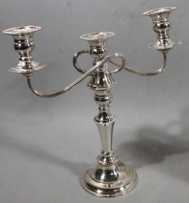 A 20thC silver plated three bottle decanter set - 2