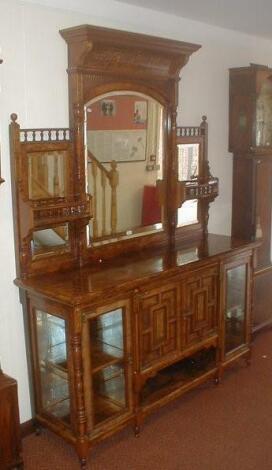 A Victorian figured walnut mirror back chiffonier with gilt scratch decoration