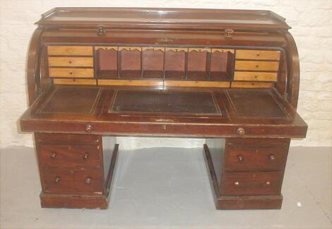 A Victorian mahogany cylinder top twin pedestal estate desk £200-300