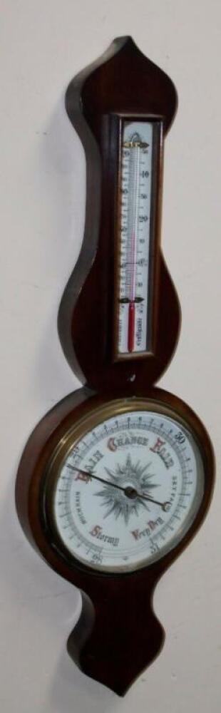 Young Barometer An early 20thC mahogany cased onion topped banjo barometer and thermometer