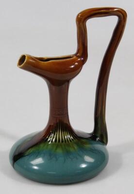 A Linthorpe pottery Dr Christopher Dresser design pottery ewer