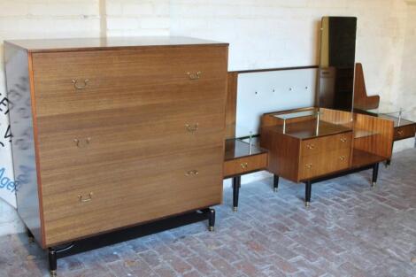 A retro teak part bedroom suite