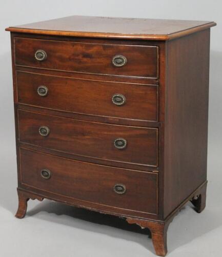 A reproduction mahogany finish D-end chest