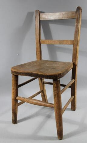 A very early 20thC ash and elm child's chair