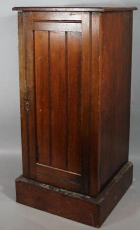 An Edwardian mahogany stained pot cupboard