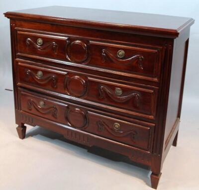 A modern mahogany finish chest