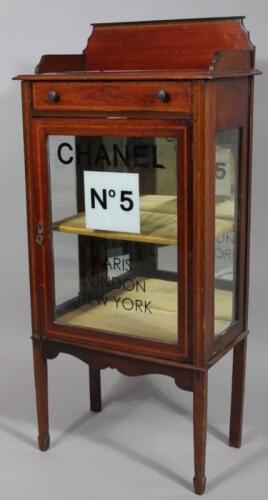 An Edwardian mahogany and boxwood strung display cabinet