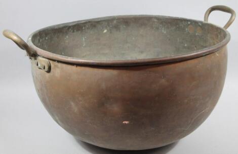 A large late 19thC industrial copper bowl