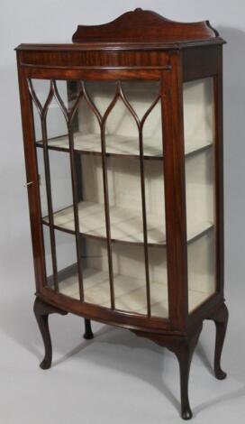 A mid 20thC mahogany display cabinet