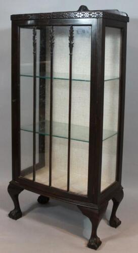 An early 20thC ebonised display cabinet