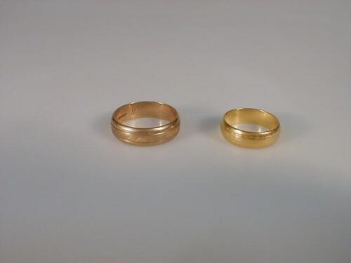 A 22ct gold wedding band and a 9ct gold band