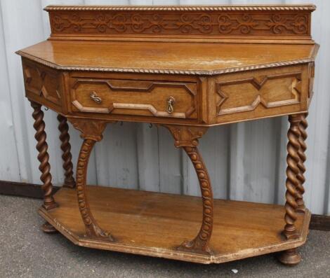 A 20thC light oak serving table