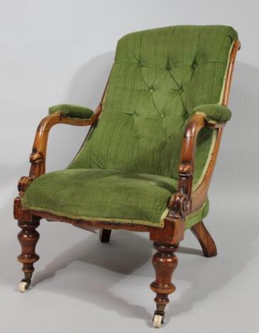 A Victorian open framed armchair