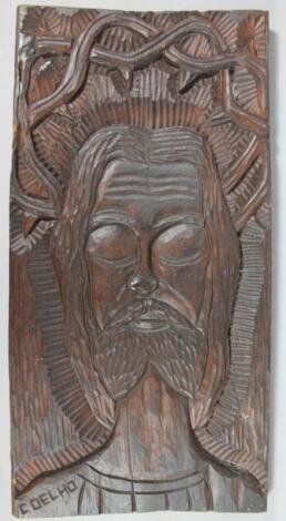 ‡Coelho (20thC). Christ shoulder front profile carved wooden panel