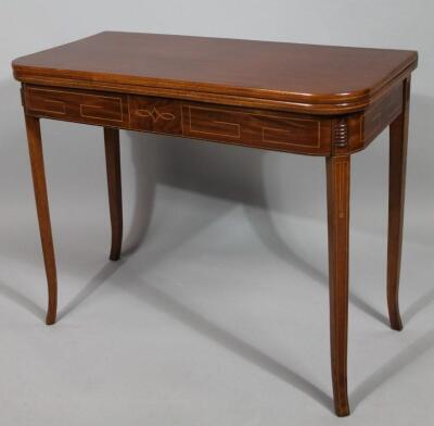 A 19thC mahogany and boxwood sprung Sheraton style tea table