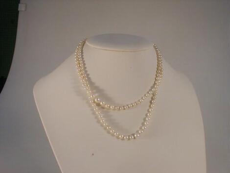 A double strand graduated cultured pearl necklace with silver and marquisette clasp