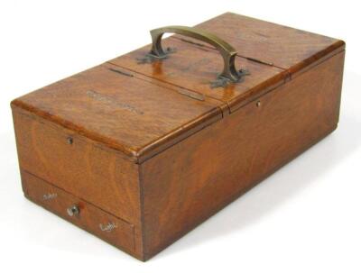 An early 20thC oak cigar and cigarette dispenser - 2