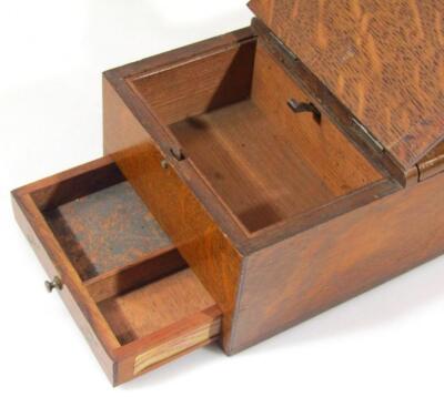 An early 20thC oak cigar and cigarette dispenser - 3