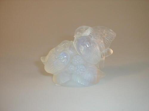 A Sabino opalescent glass bird group