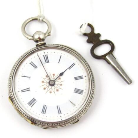 A silver fob watch