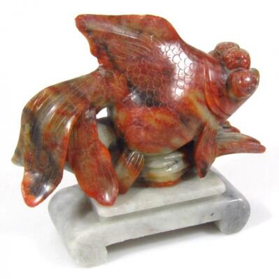 A 20thC tri-coloured soapstone figure of a fish - 3