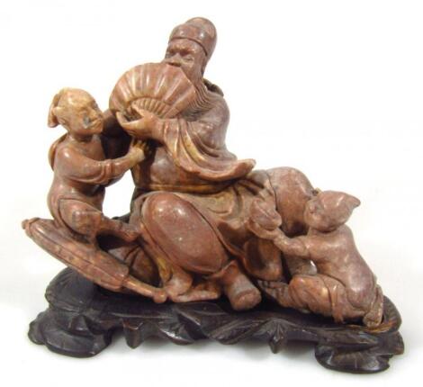 An early 20thC Chinese soapstone figure group