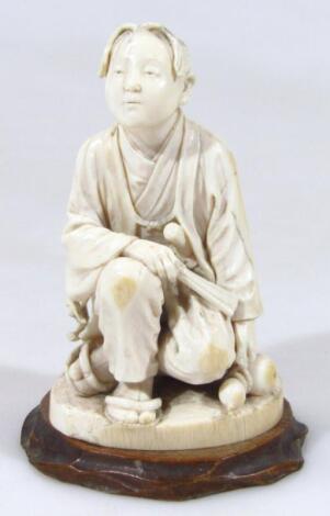 A Japanese Meiji period ivory figure