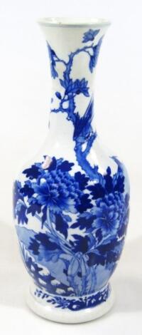 A Chinese porcelain blue and white Ming style vase