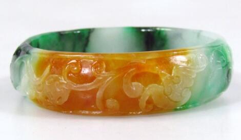 A Burmese style tri-colour jade bangle