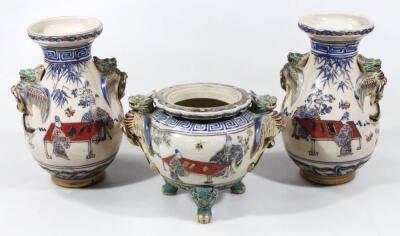 A Japanese earthenware garniture