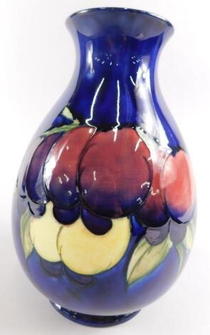 A Moorcroft Wisteria pattern inverted baluster vase