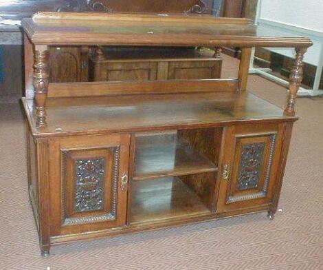 A late Victorian carved walnut buffet