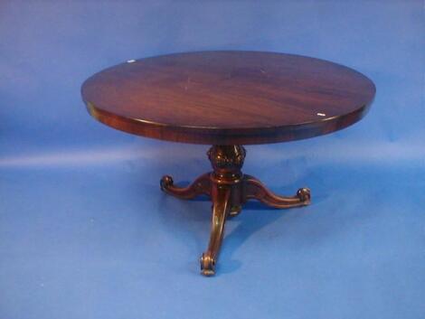 A Victorian walnut breakfast table with circular tilt top