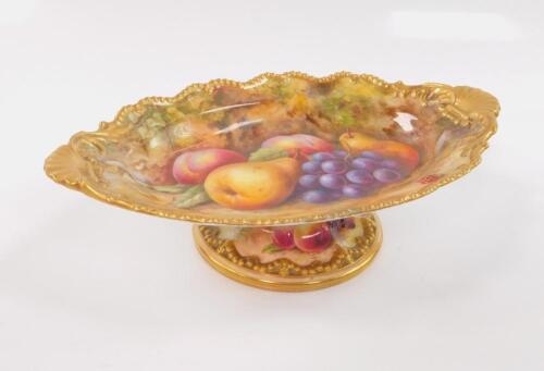 A Royal Worcester porcelain tazza painted with fruit by T Lockyer