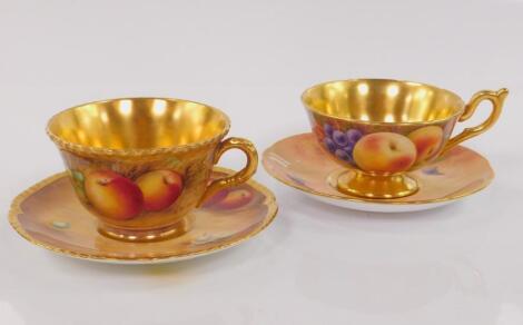 A Royal Worcester porcelain tea cup and saucer