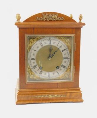 A Lenzkirk walnut cased mantel clock