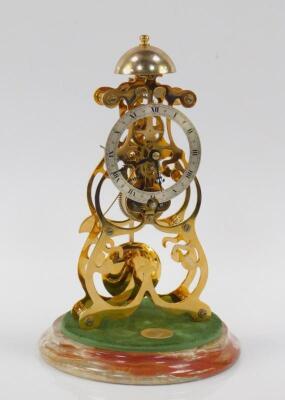 A Thwaites & Reed brass skelton clock - 2