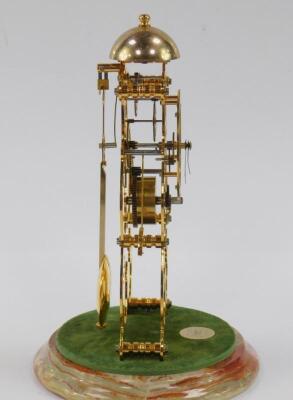 A Thwaites & Reed brass skelton clock - 3