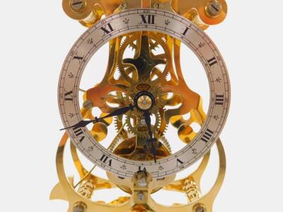 A Thwaites & Reed brass skelton clock - 5