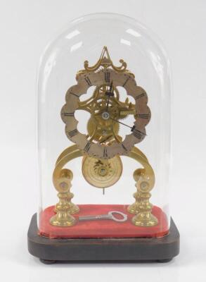 A Victorian brass skeleton clock