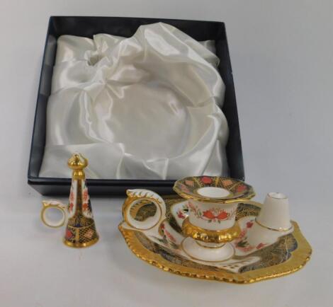 A Royal Crown Derby porcelain chamber stick and snuffer