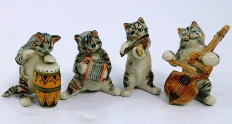 A pottery four piece cat band